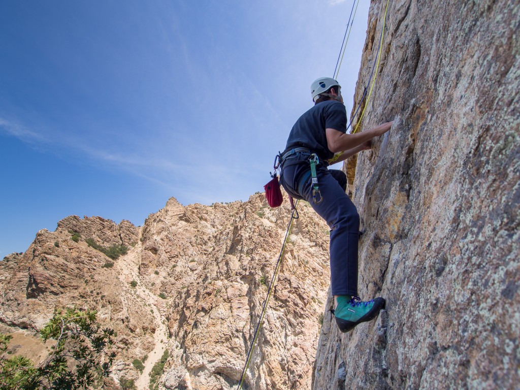 These Scarpa Brio rock shoes have been resoled twice, and are older than the climber who's wearing them.